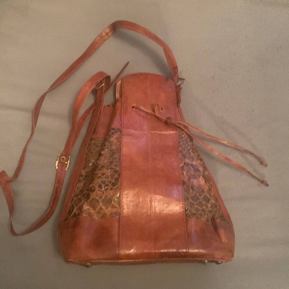 VINTAGE, leather triangle bag.  Excellent Condition Like New.